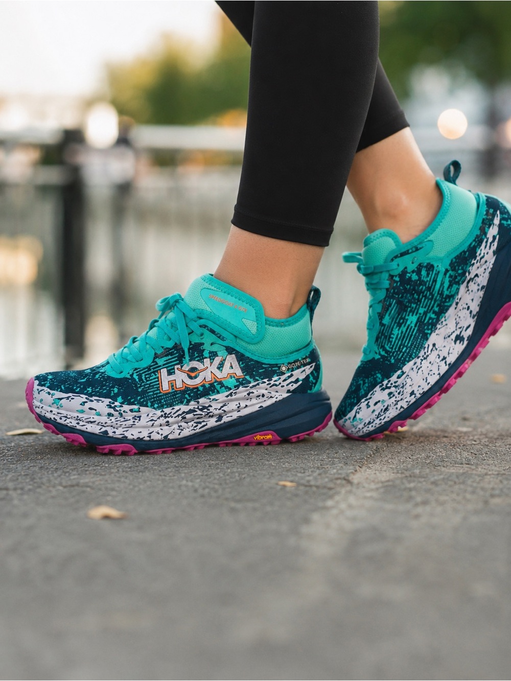Hoka One One Teal and Navy Women's Trail Running Shoes with Pink Outsole Accents